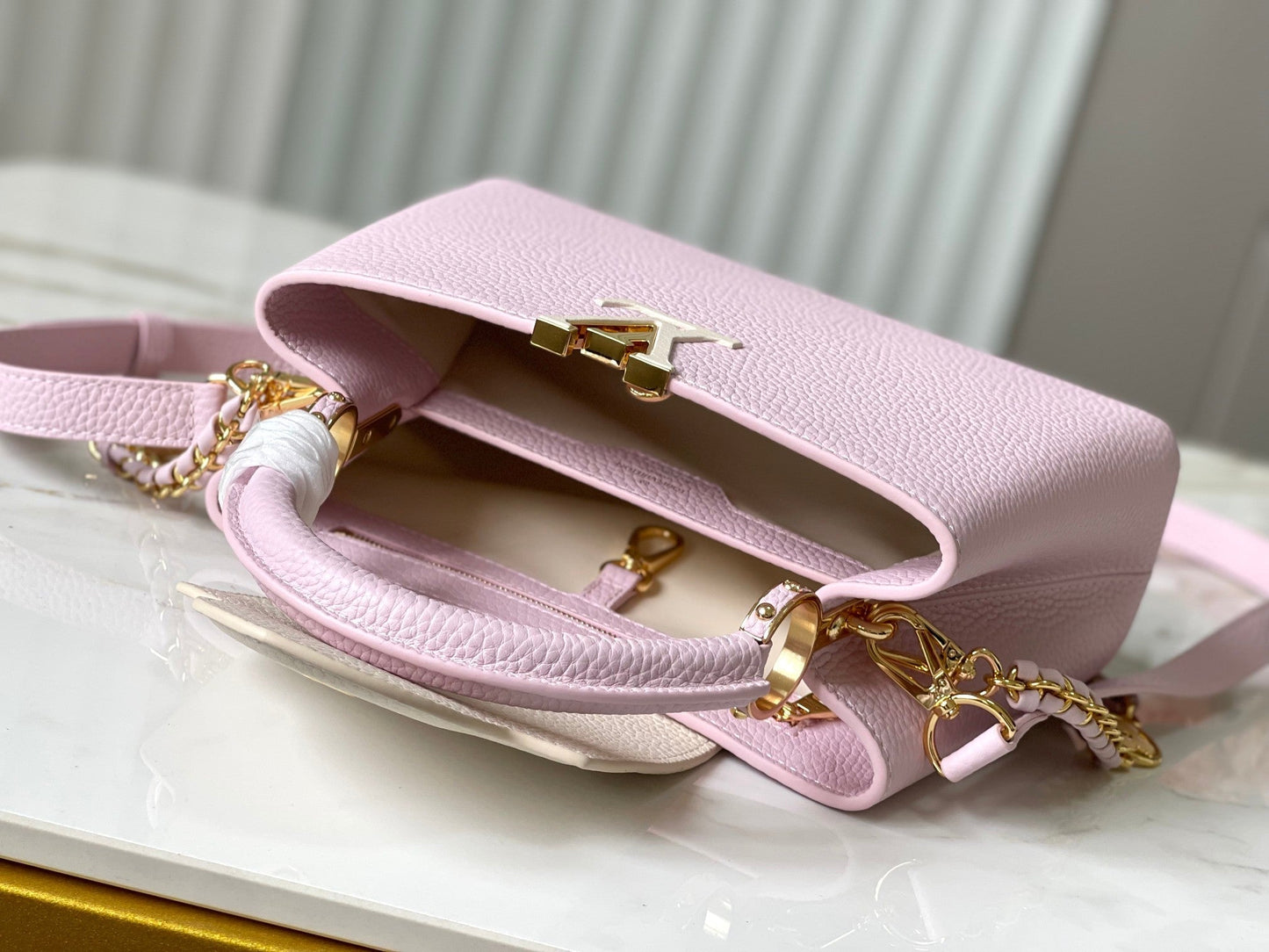 capucines bb 27 pink taurillon leather gold hardware