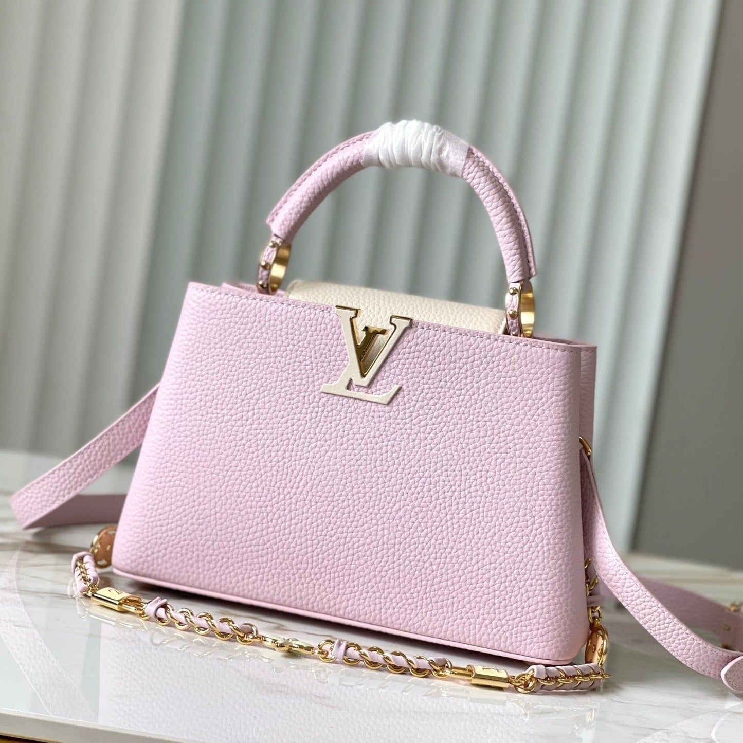 capucines bb 27 pink taurillon leather gold hardware