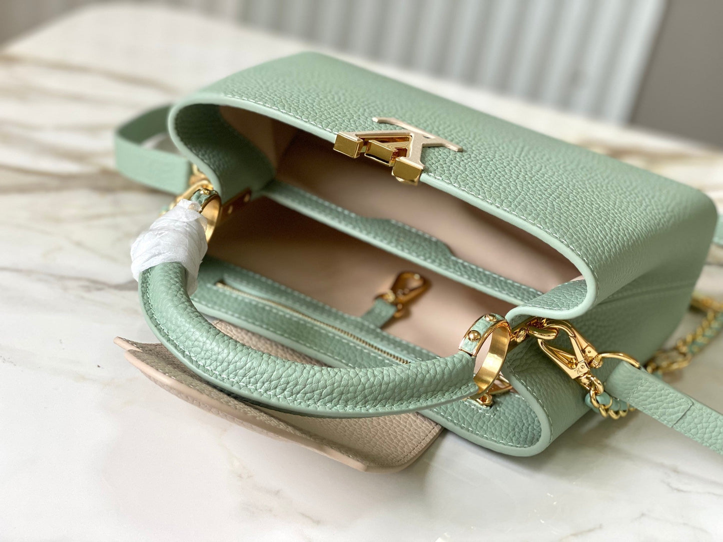 capucines bb 27 green beige taurillon leather gold hardware