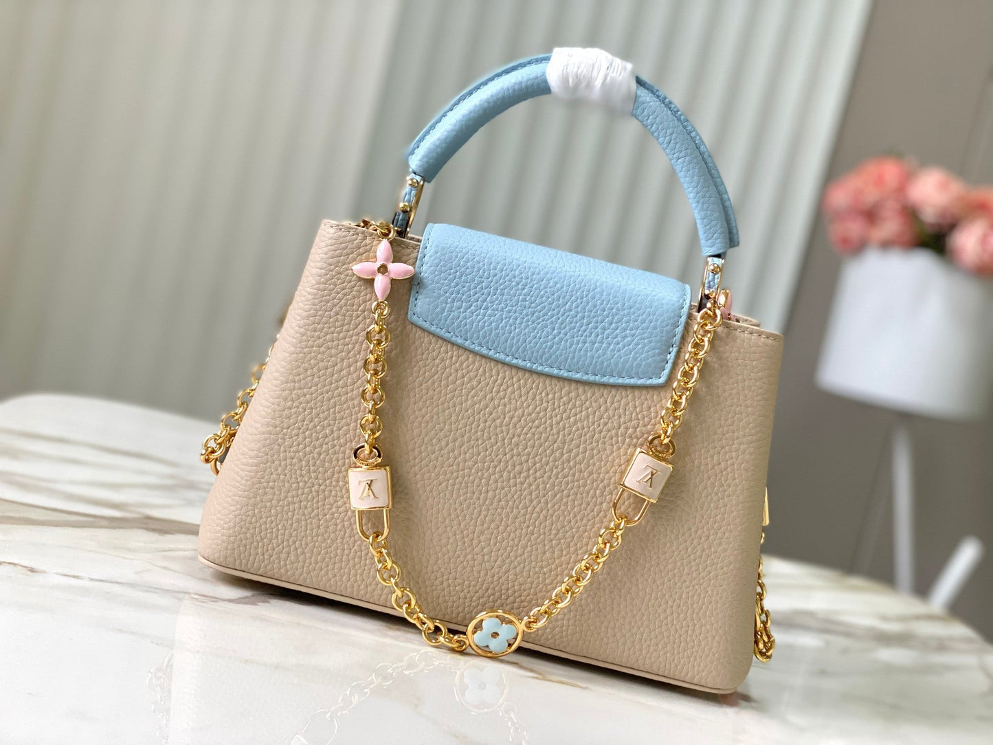 capucines bb 27 beige cloud blue taurillon leather gold hardware