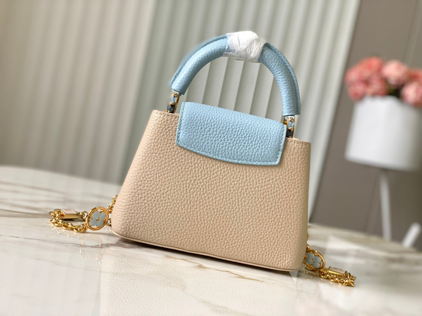 capucines mini 21 beige cloud blue taurillon leather gold hardware