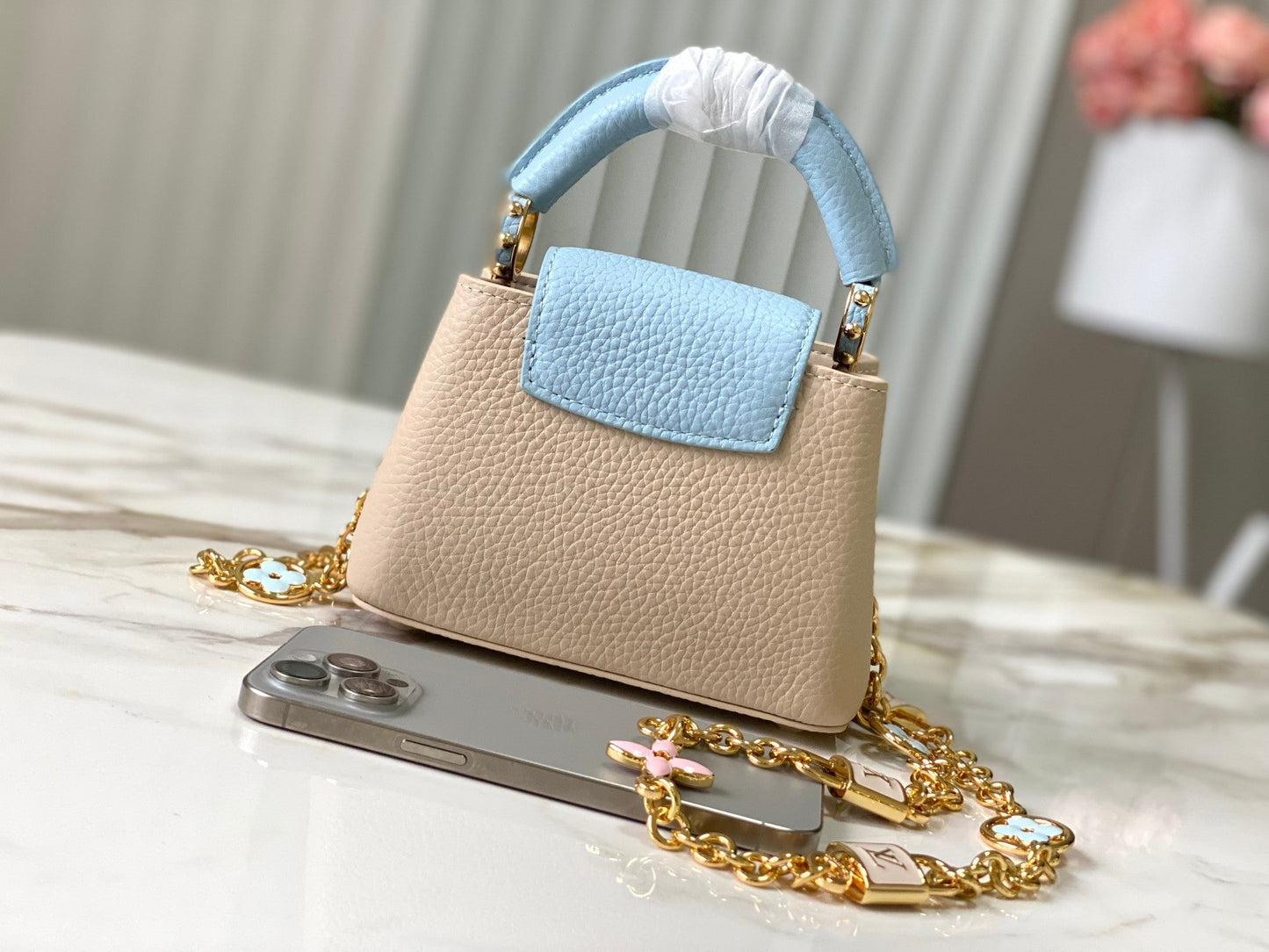 capucines nano 16 beige cloud blue taurrilon leather gold hardware