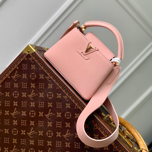 capucines mini 21 pink taurillon leather gold hardware