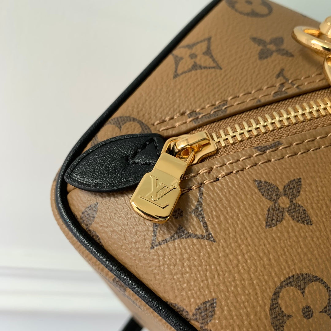 just in case 13cm beige monogram canvas black calfskin