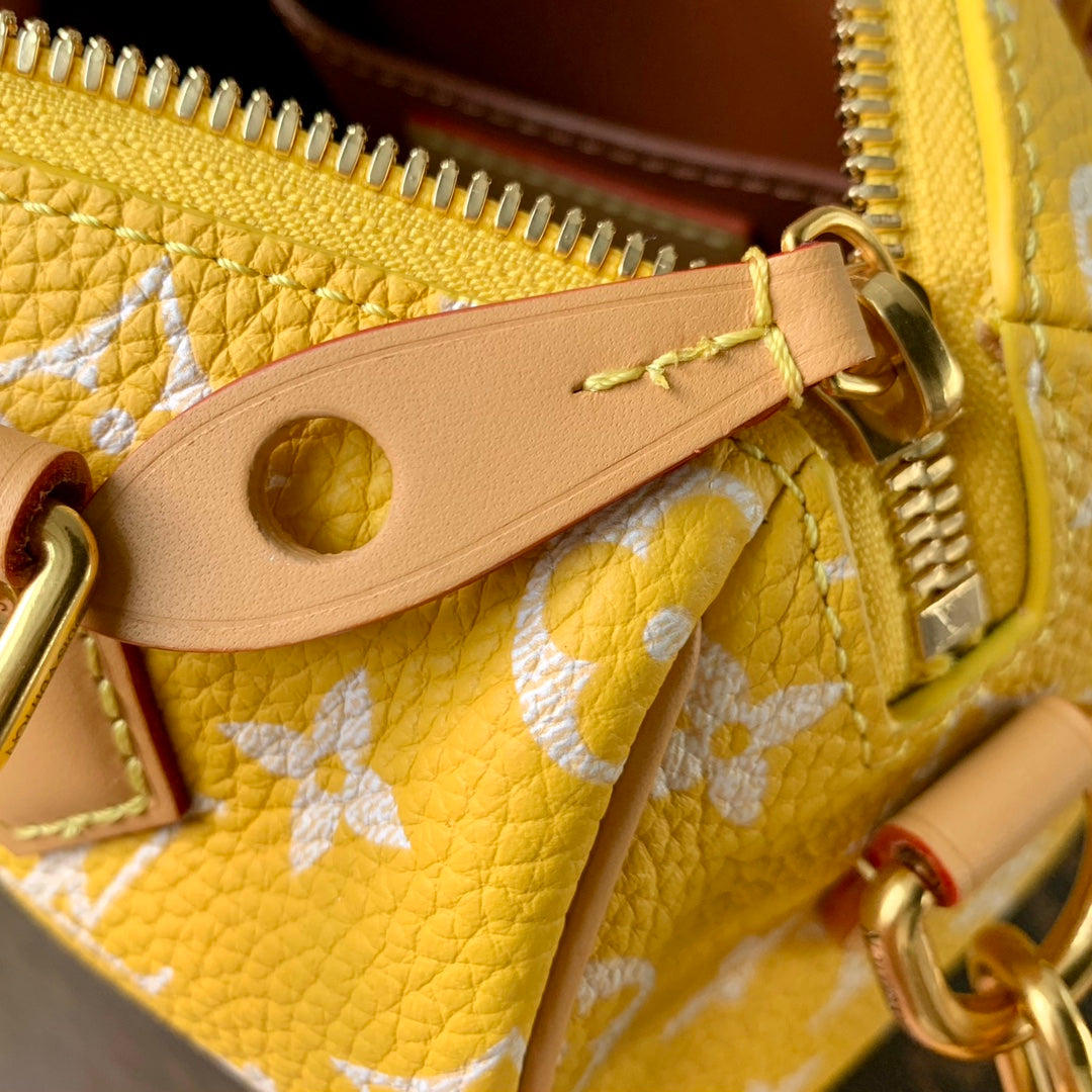 speedy p9 bandouliere 18cm yellow calfskin