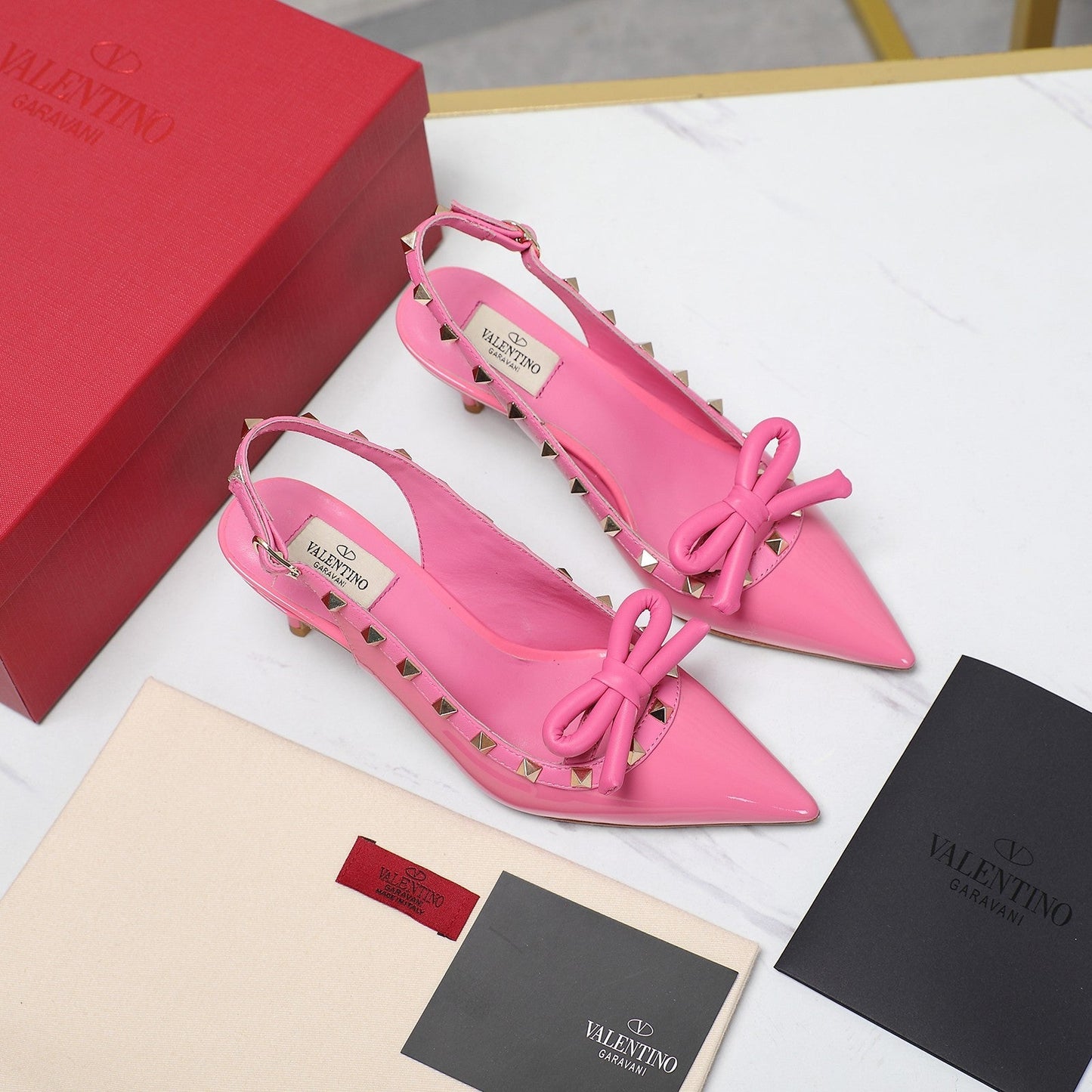 ROCKSTUD BOW SLINGBACK FUSCA PINK PATENT LEATHER PUMP 60MM