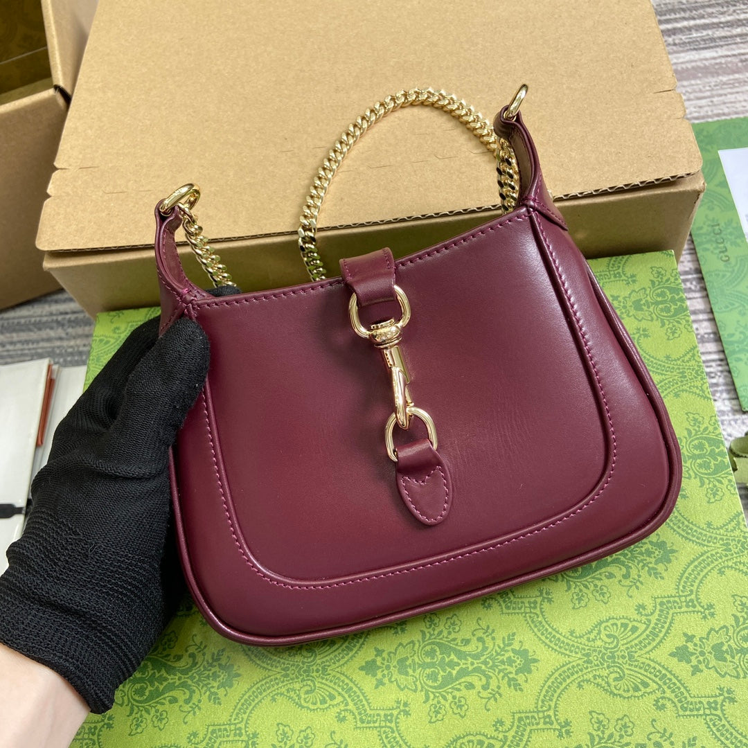 JACKIE NOTTE MINI BAG 19 IN BURGUNDY RED CALFSKIN GOLD HARDWARE