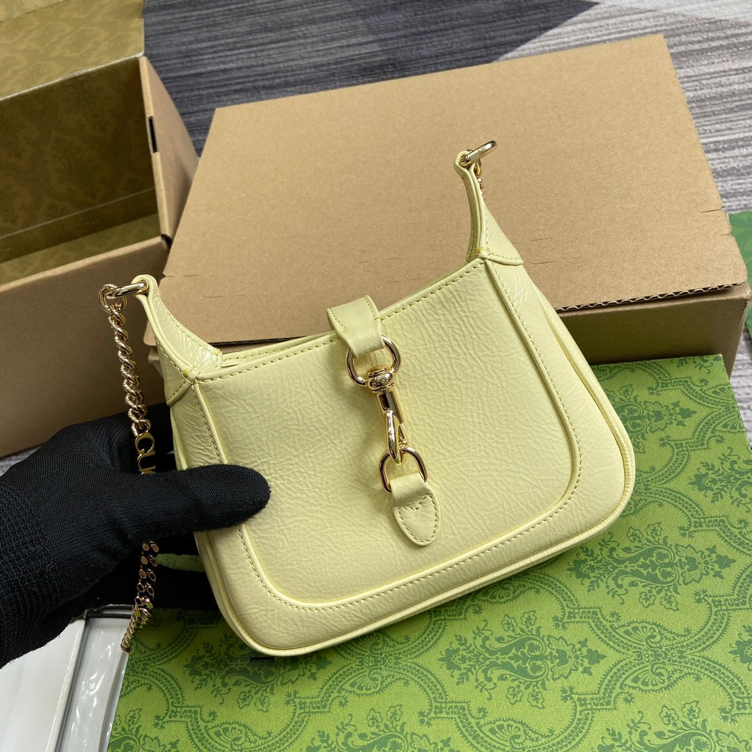 JACKIE NOTTE MINI BAG 19 IN LIGHT YELLOW CRACKED LACQUER CALFSKIN GOLD HARDWARE