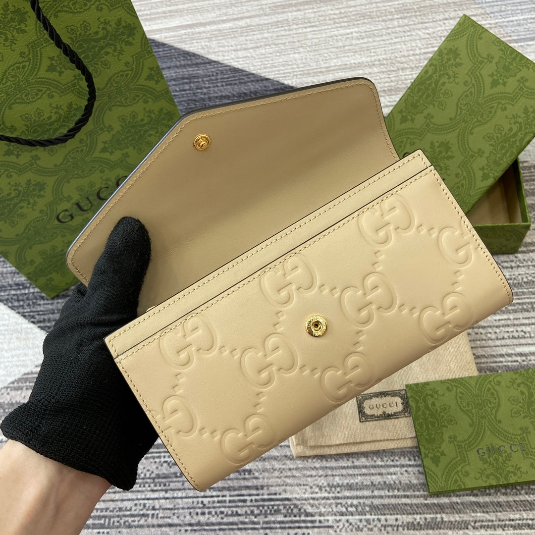 CONTINENTAL WALLET 19 IN LIGHT YELLOW EMBOSSED CALFSKIN GOLD HARDWARE