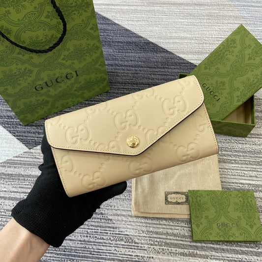 CONTINENTAL WALLET 19 IN LIGHT YELLOW EMBOSSED CALFSKIN GOLD HARDWARE