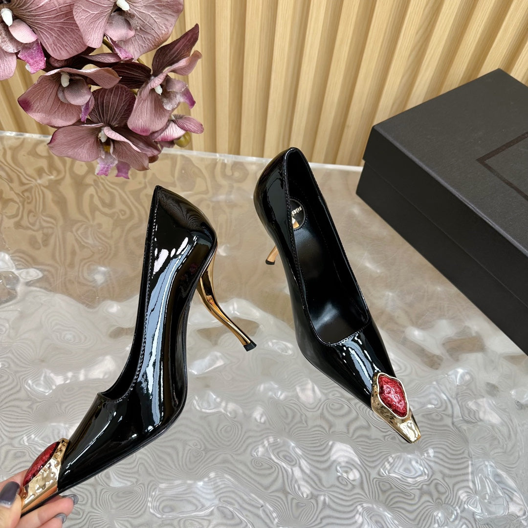 RED GEM-STUDDED HIGH PUMPS IN BLACK PATENT CALFSKIN