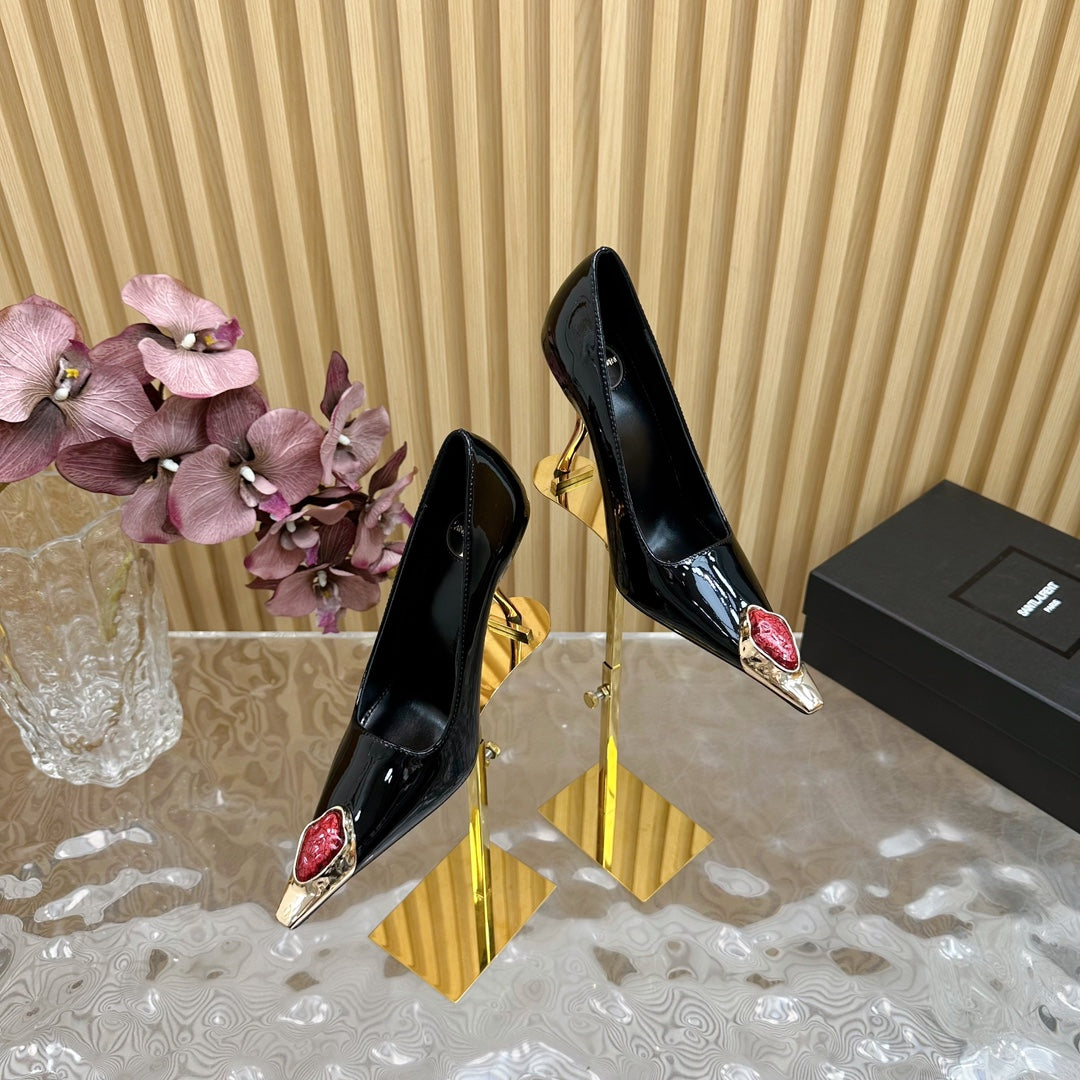 RED GEM-STUDDED HIGH PUMPS IN BLACK PATENT CALFSKIN