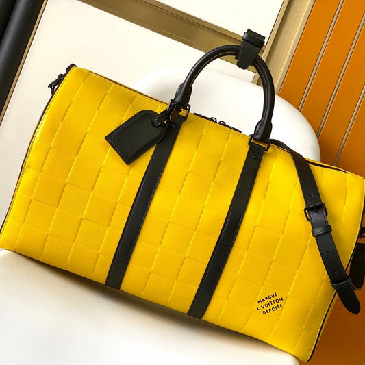 KEEPALL BANDOULIÈRE 50 IN YELLOW DAMIER SCUBA CALFSKIN