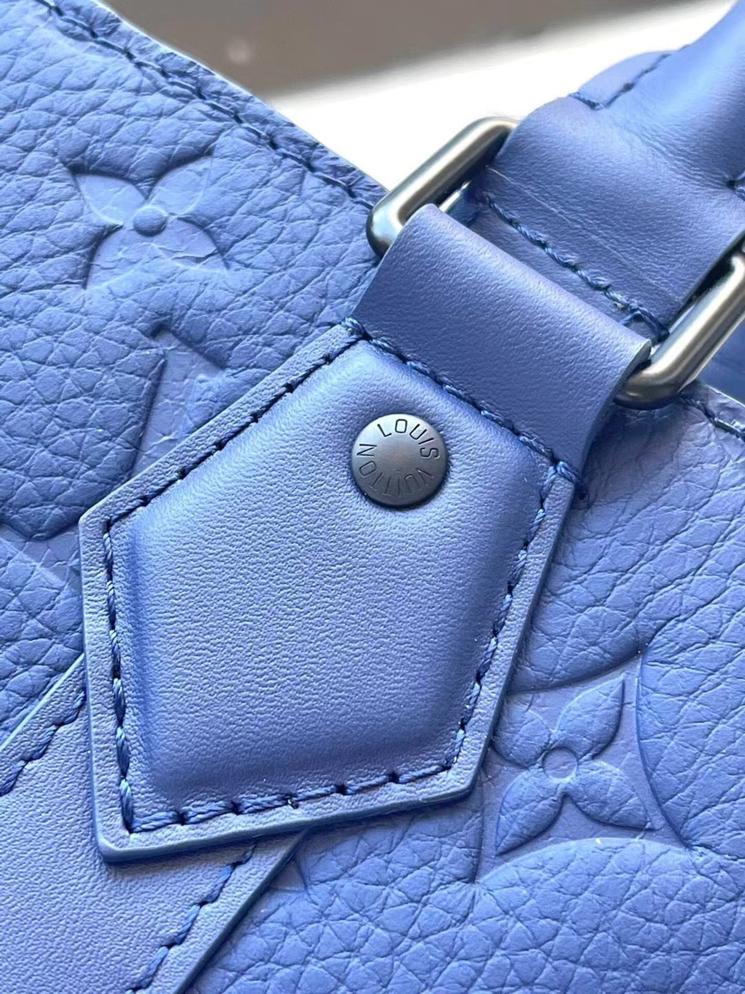 SAC PLAT 24H 41 IN SAPPHIRE BLUE MONOGRAM EMBOSSED TAURILLON