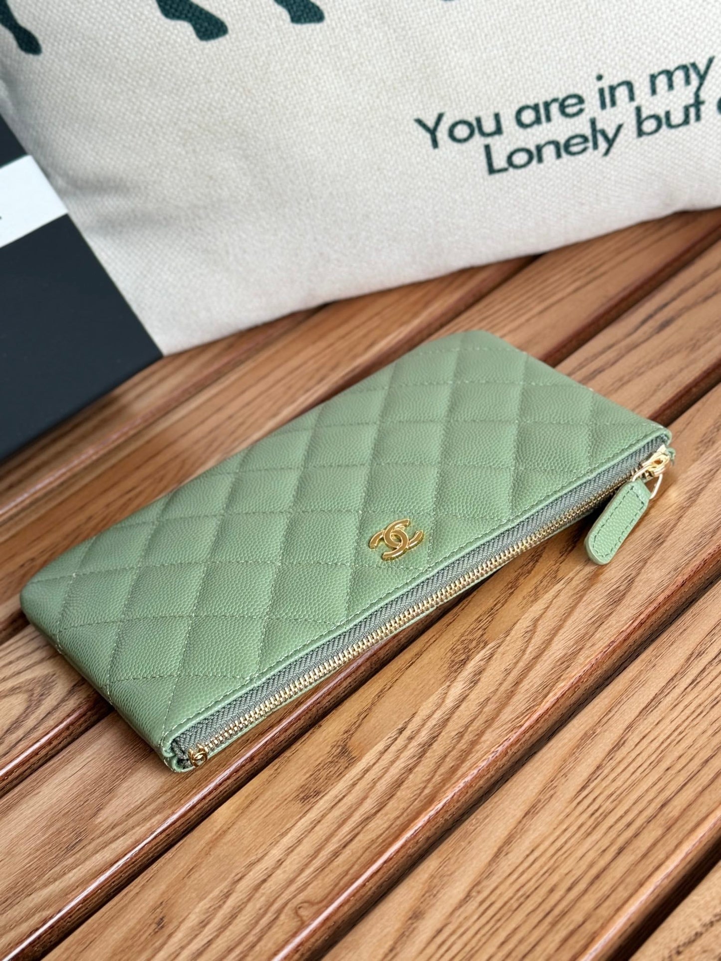 cc zipped wallet 20cm green quilted caviar gold hardware