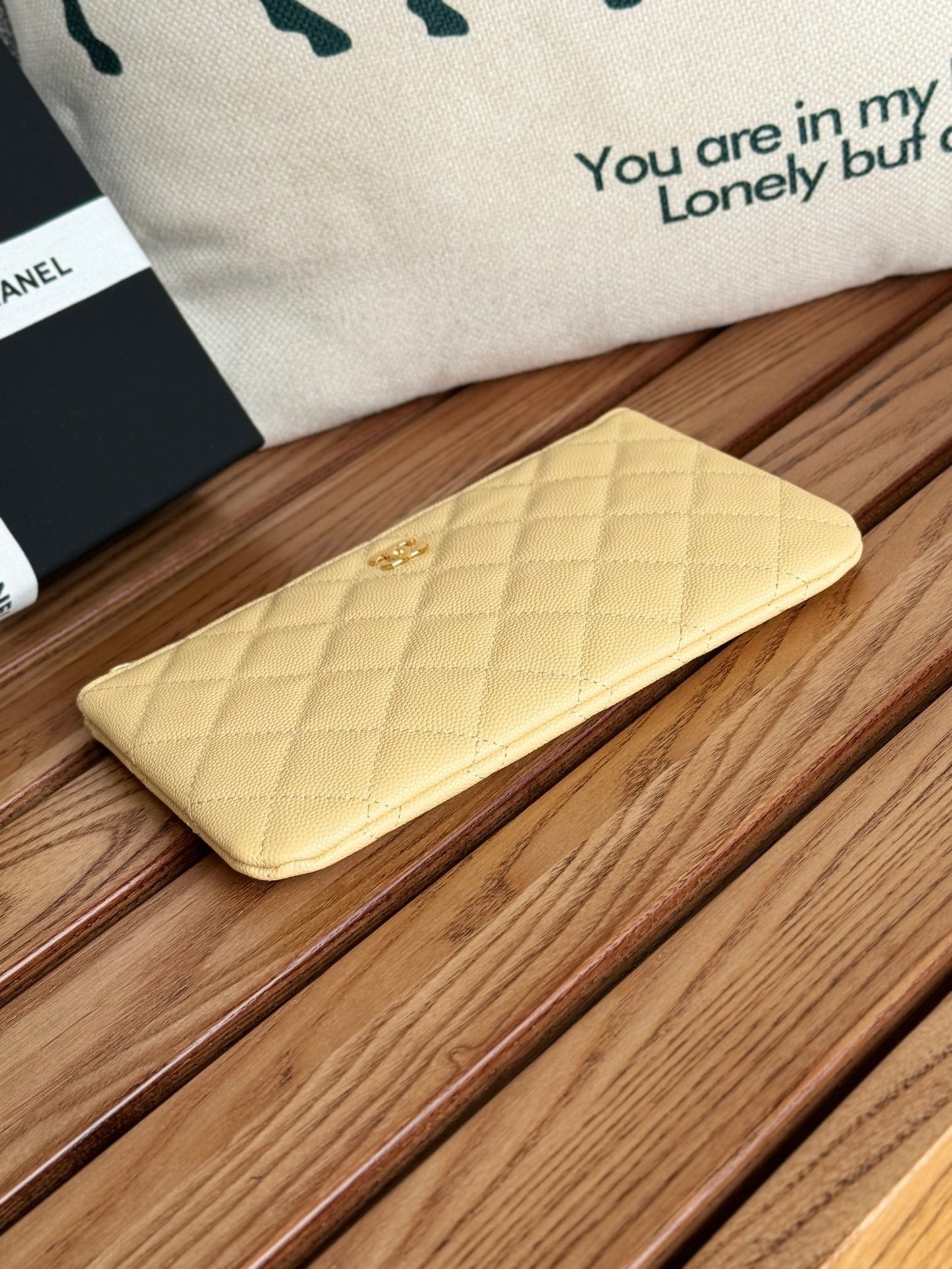 cc zipped wallet 20cm light yellow quilted caviar gold hardware