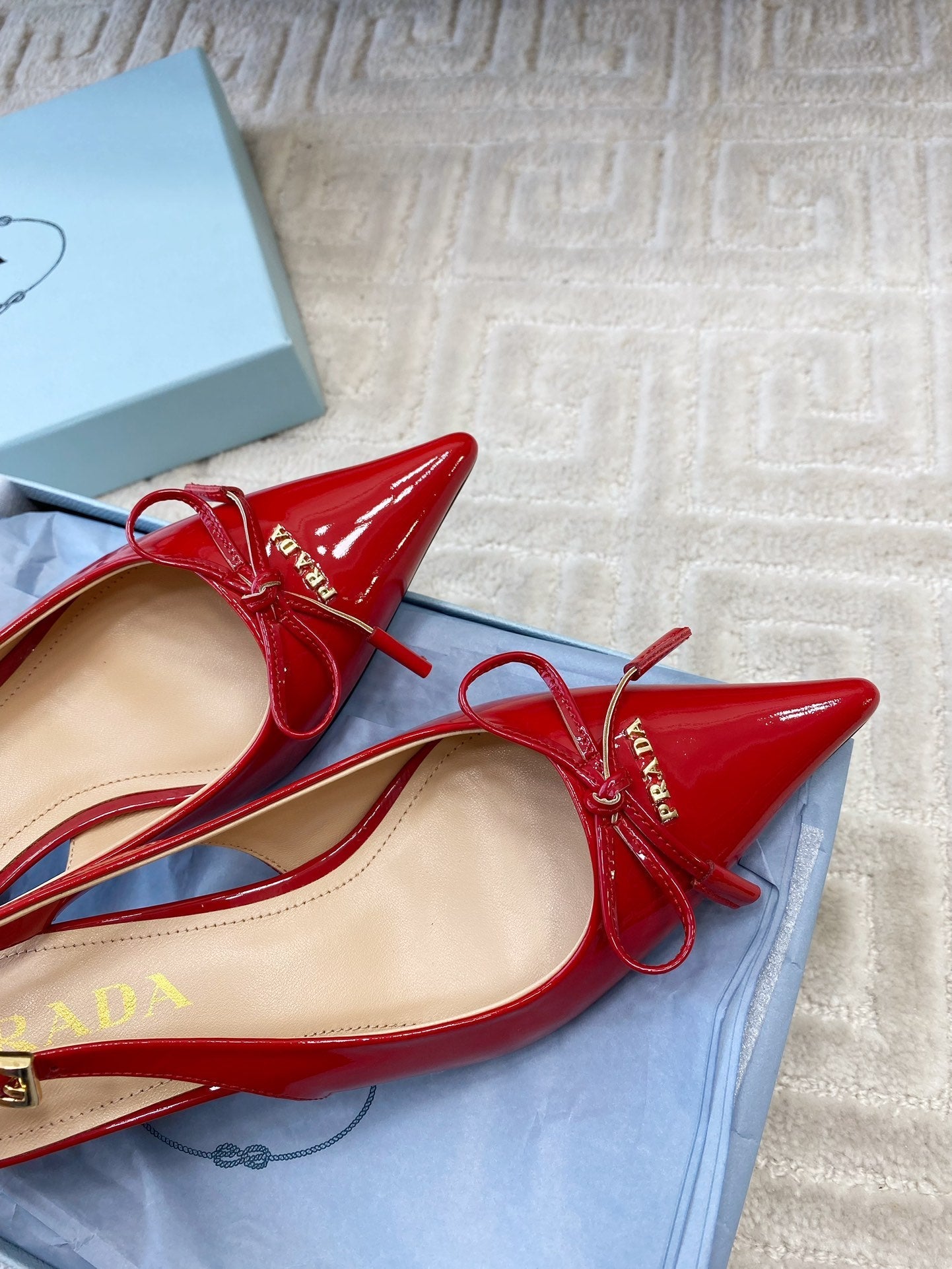 SLINGBACK PUMPS ATTACHED BOW IN PASSION RED GLOSSY CALFSKIN