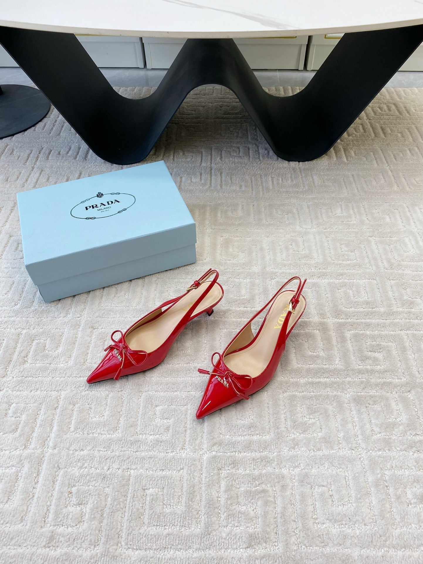 SLINGBACK PUMPS ATTACHED BOW IN PASSION RED GLOSSY CALFSKIN