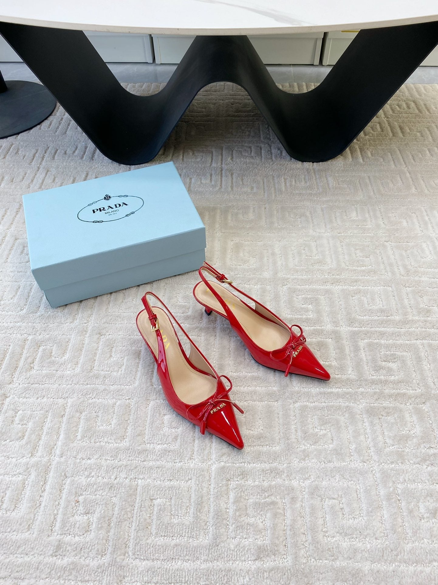 SLINGBACK PUMPS ATTACHED BOW IN PASSION RED GLOSSY CALFSKIN