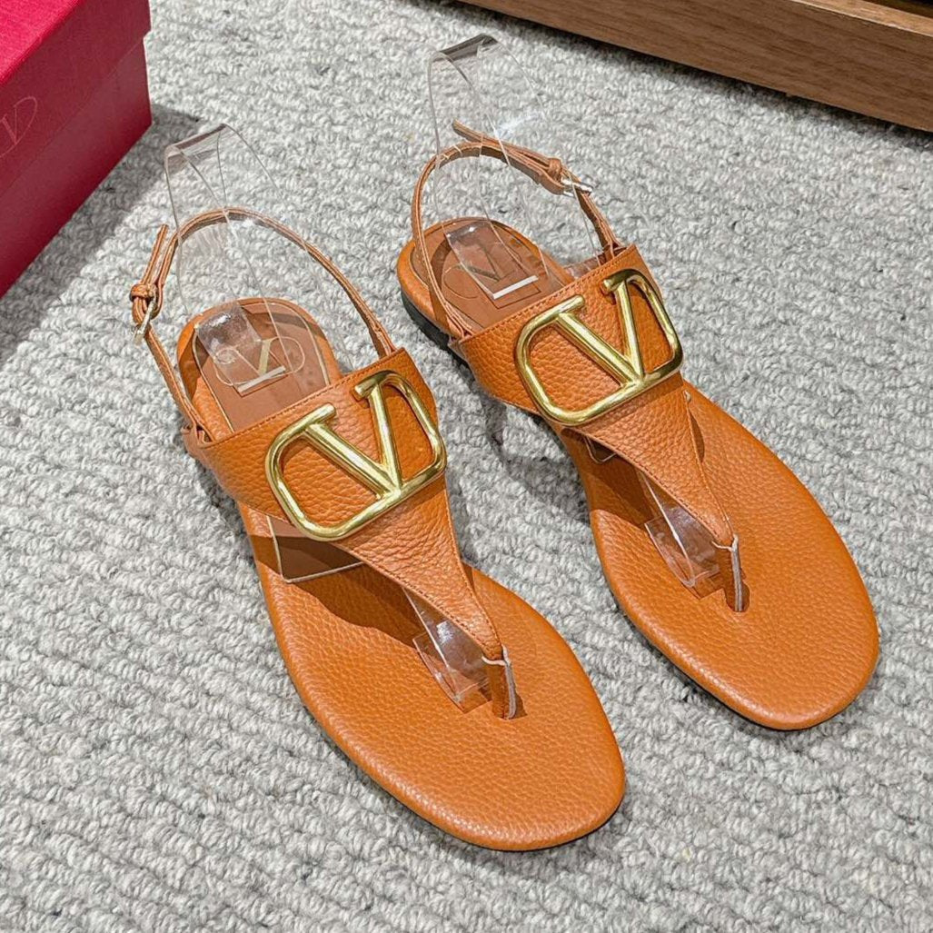 THONG SANDAL IN GINGER ORANGE CALFSKIN WITH GOLD LOGO