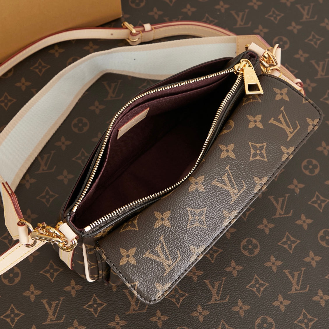 VIVACITÉ 25 IN BROWN MONOGRAM CANVAS GOLD HARDWARE