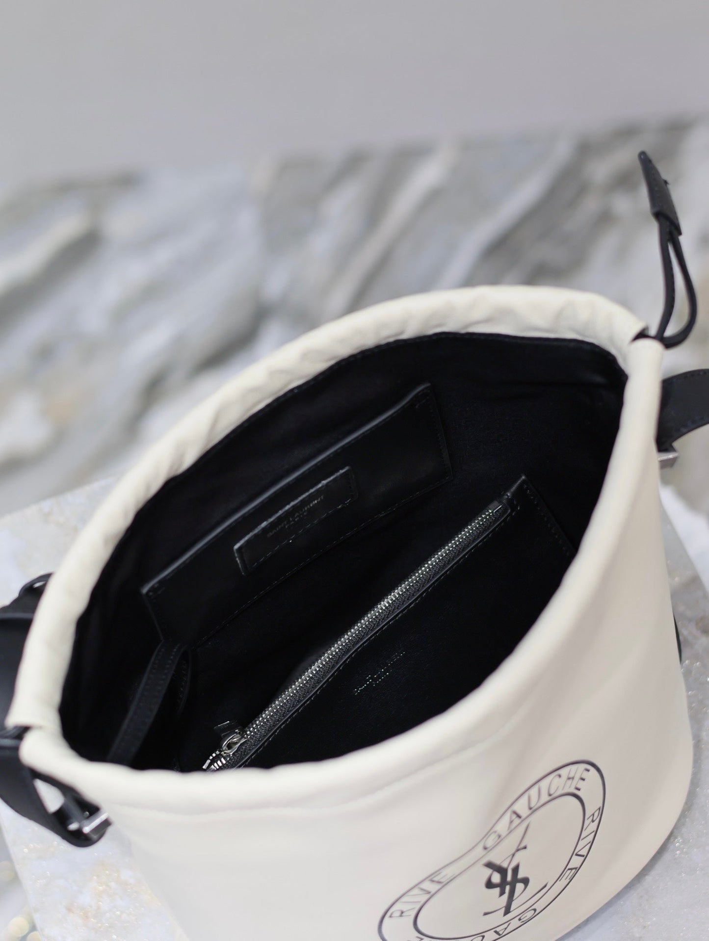 RIVE GAUCHE BUCKET BAG 23 IN WHITE CALFSKIN