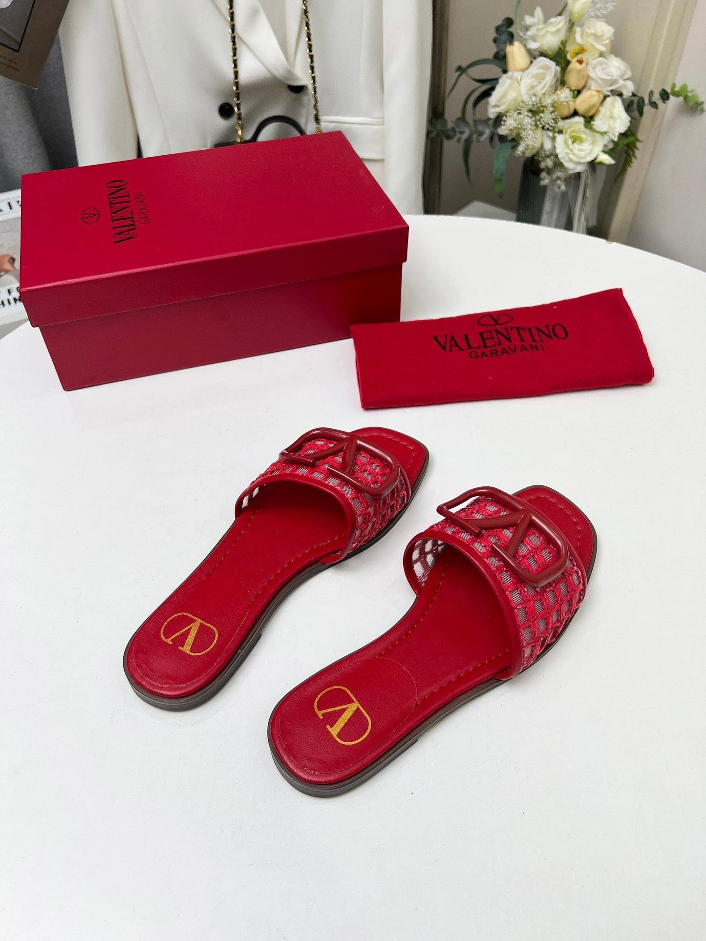 Vlogo embellished leather-trimmed raffia slides red