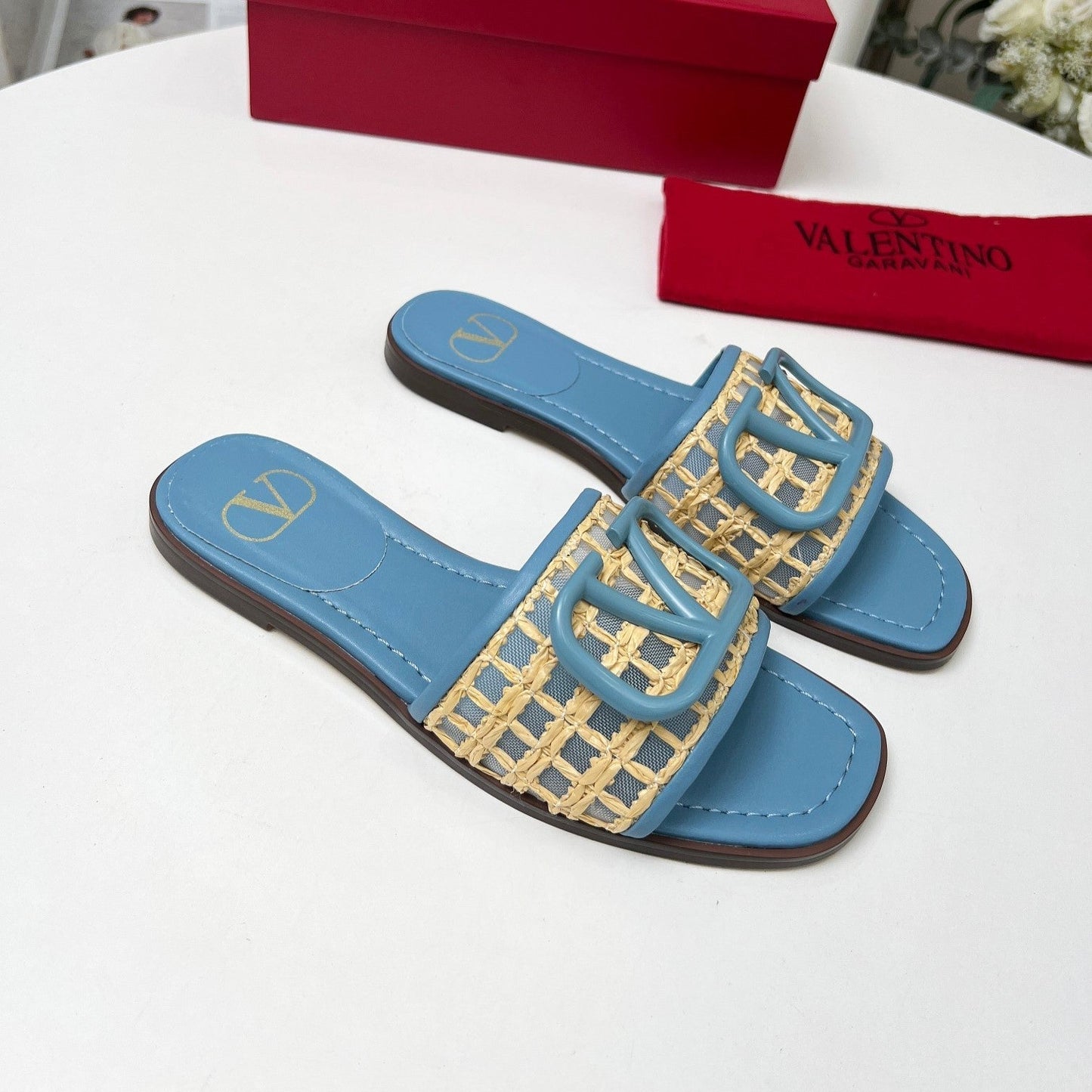 Vlogo embellished leather-trimmed raffia slides baby blue