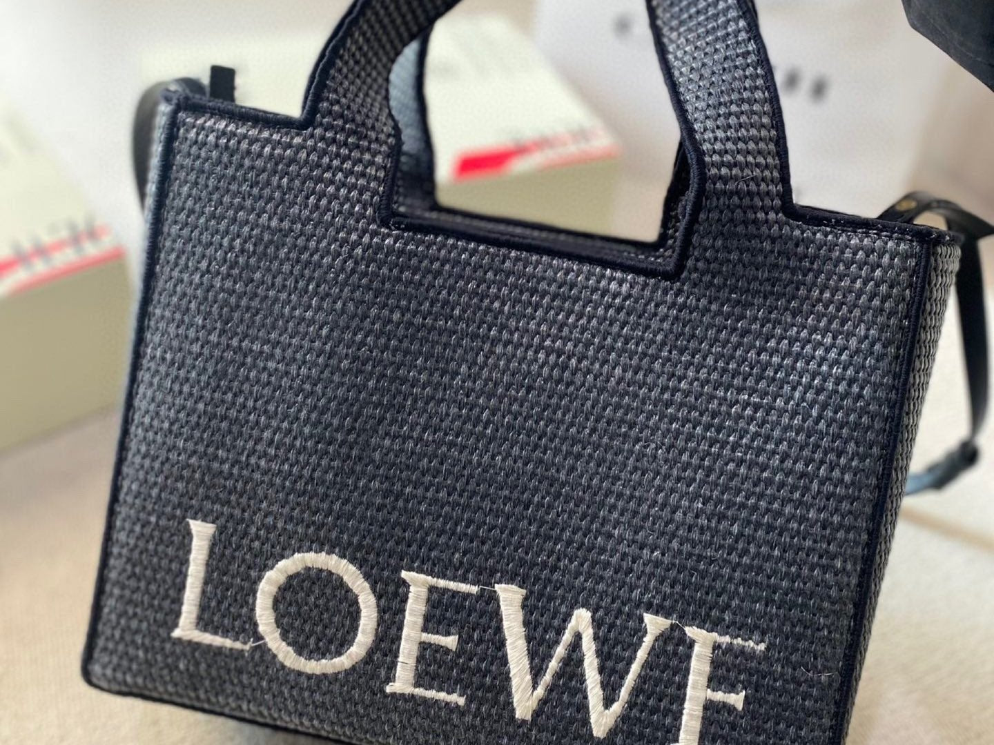 LOE LARGE 32 FONT TOTE IN BLACK RAFFIA