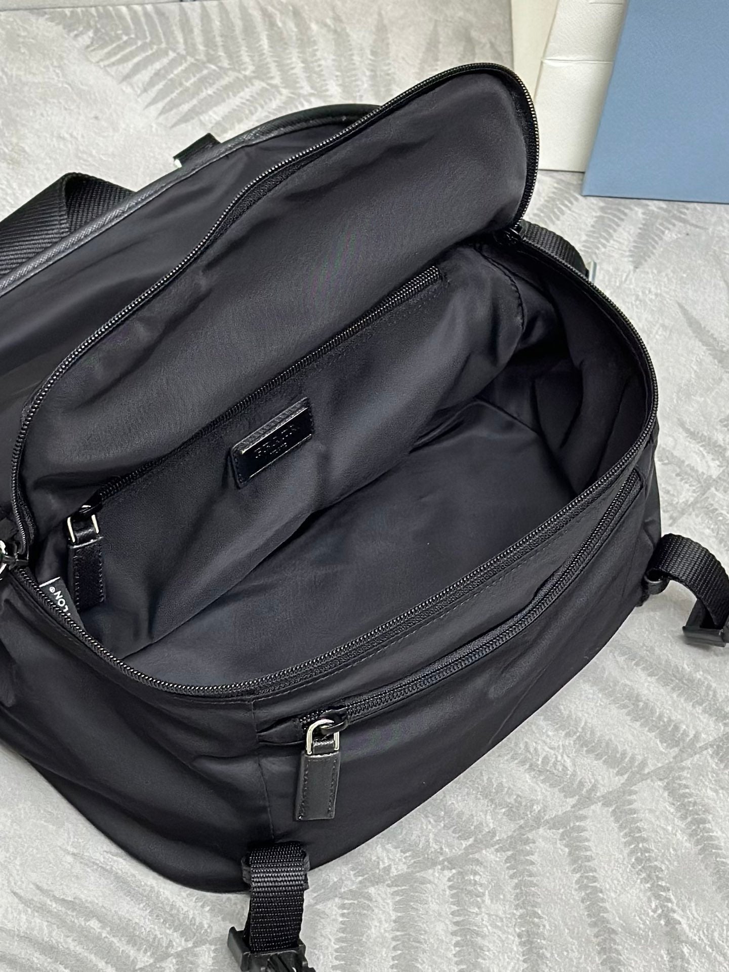 SHOULDER BAG 27 IN BLACK RE-NYLON TRIANGLE LOGO