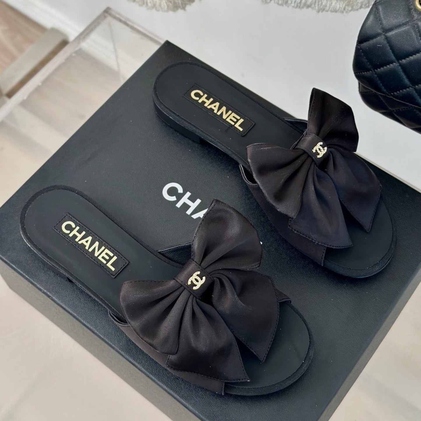 cc big bow flat sandals black lambkin