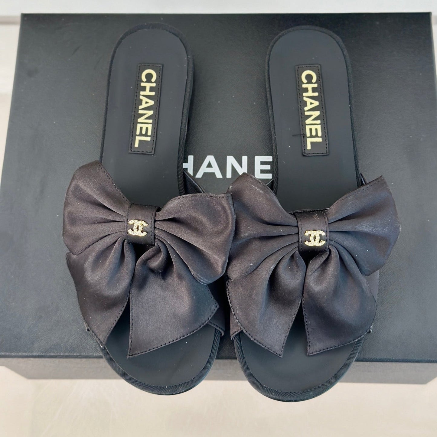 cc big bow flat sandals black lambkin