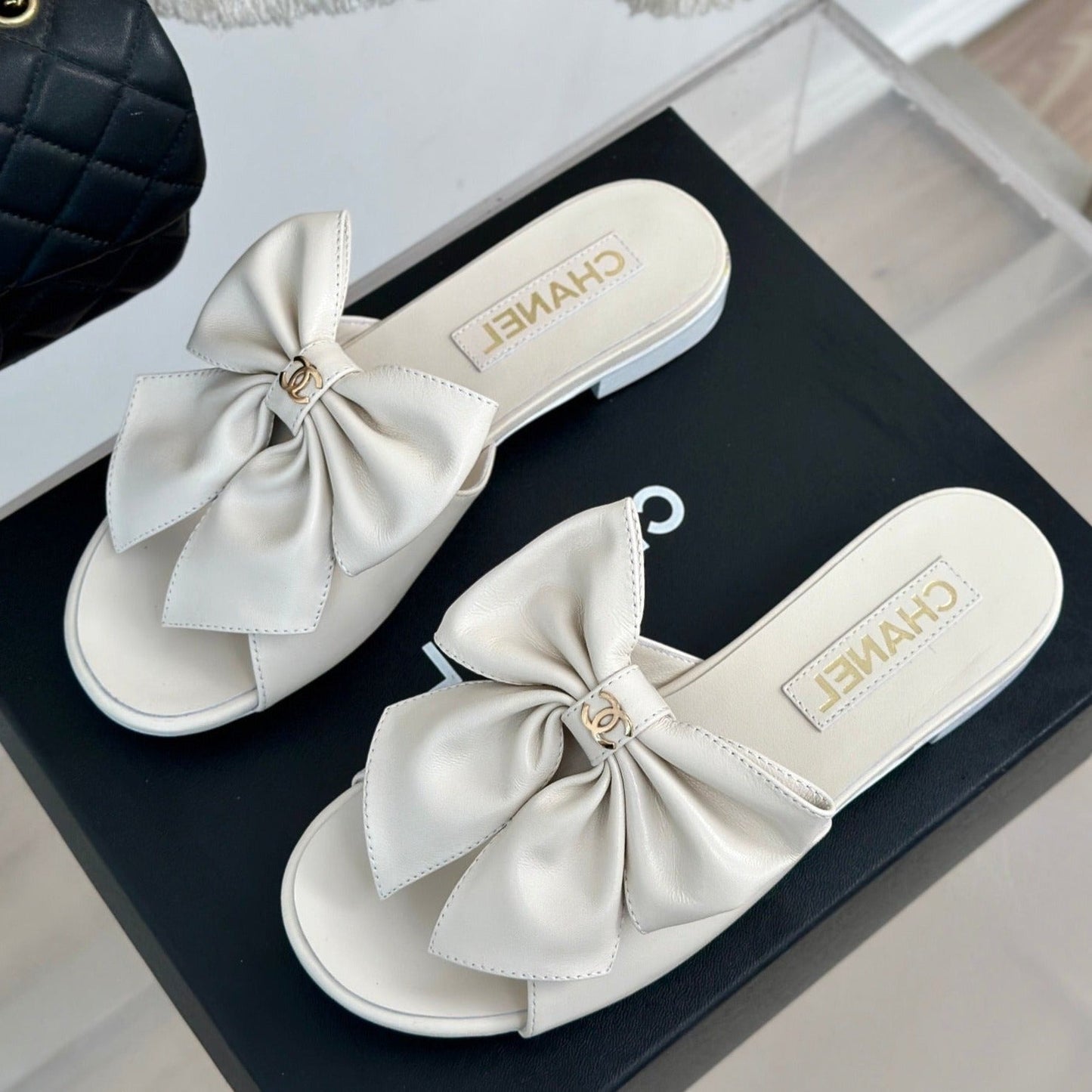 cc big bow flat sandals white lambkin