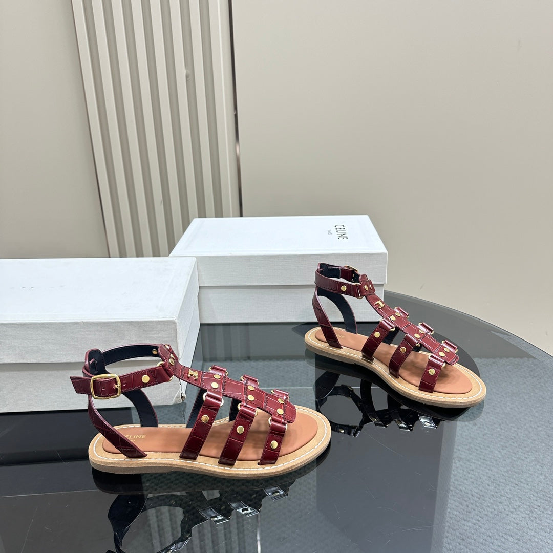 TRIUMPH FLAT SANDALS IN GARNET RED CALFSKIN