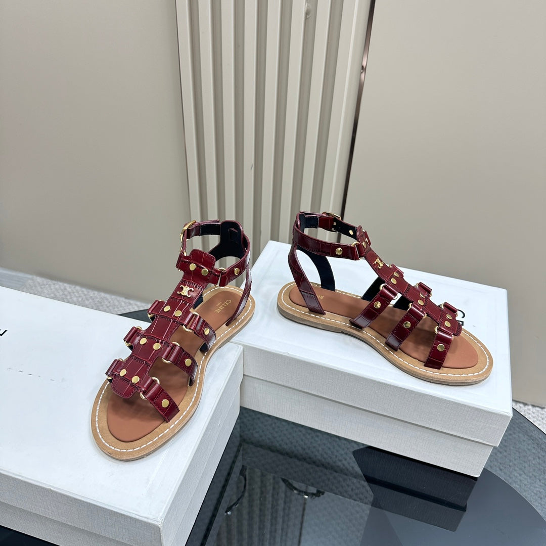 TRIUMPH FLAT SANDALS IN GARNET RED CALFSKIN