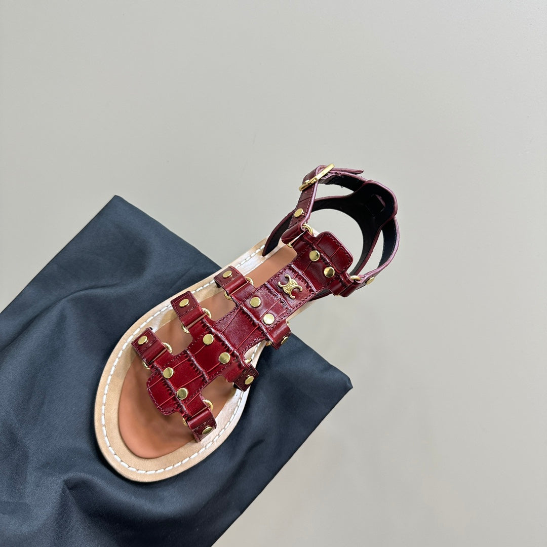 TRIUMPH FLAT SANDALS IN GARNET RED CALFSKIN