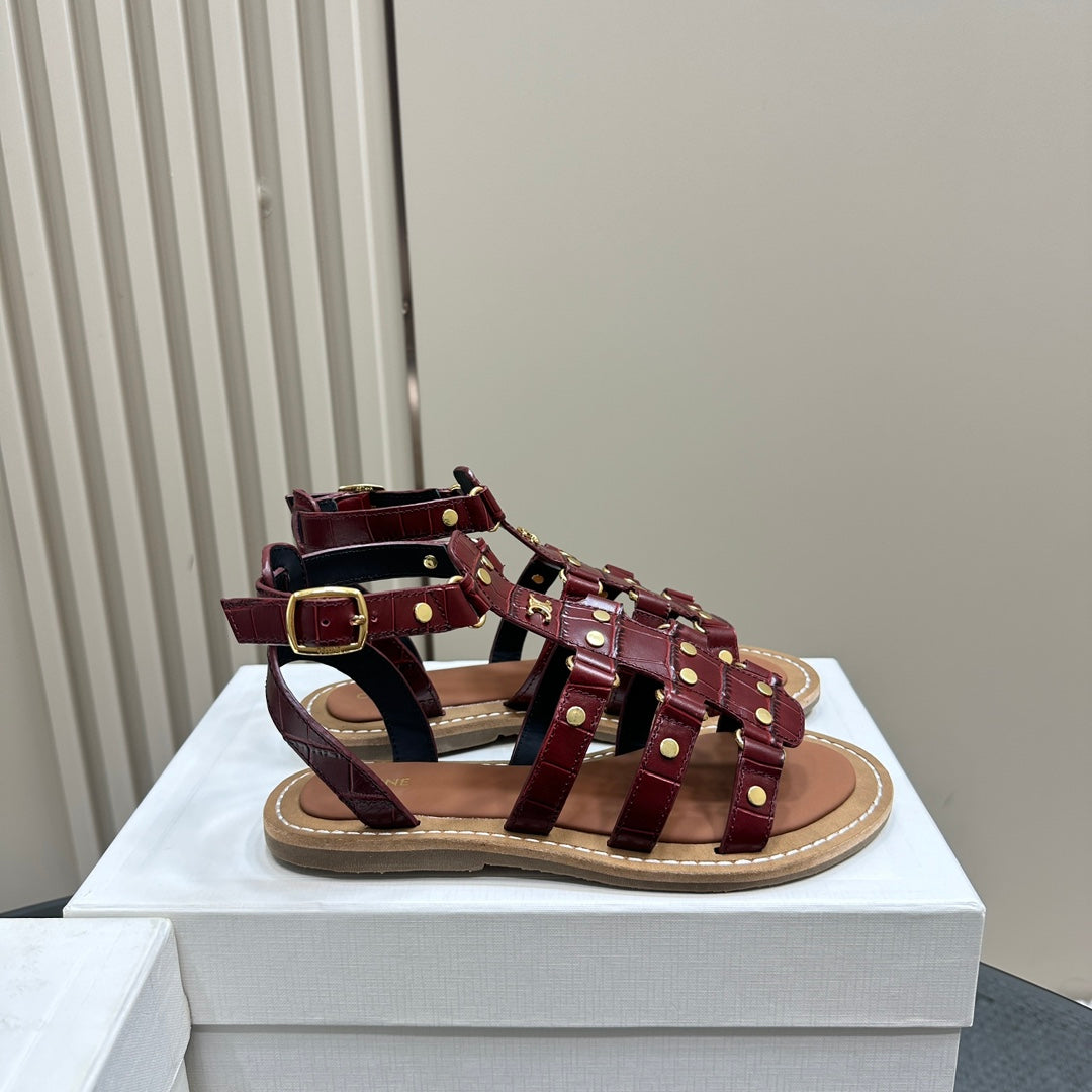 TRIUMPH FLAT SANDALS IN GARNET RED CALFSKIN