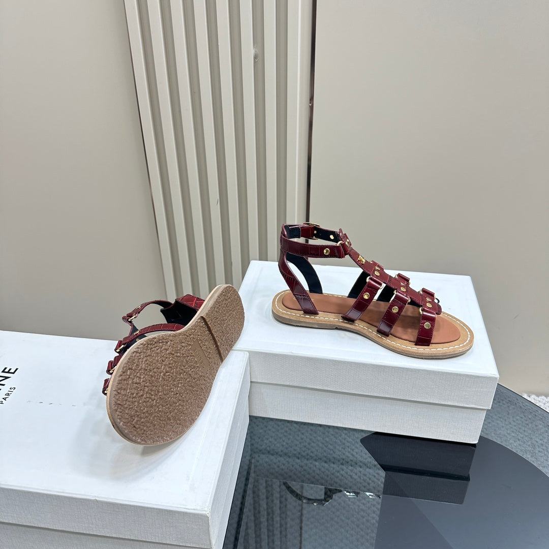 TRIUMPH FLAT SANDALS IN GARNET RED CALFSKIN