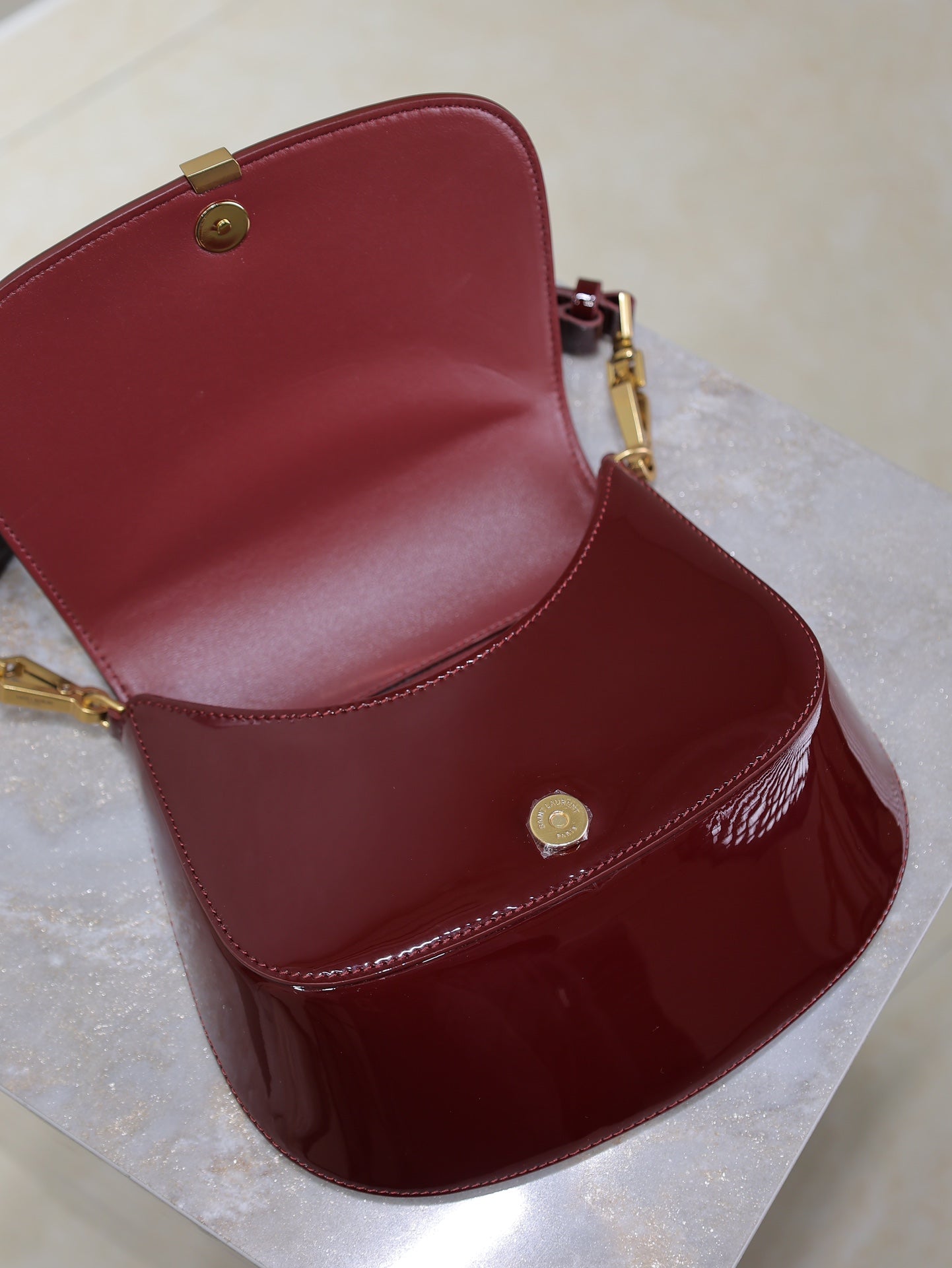 VOLTAIRE SADDLE BAG 21 IN BORDEAUX RED PATENT CALFSKIN