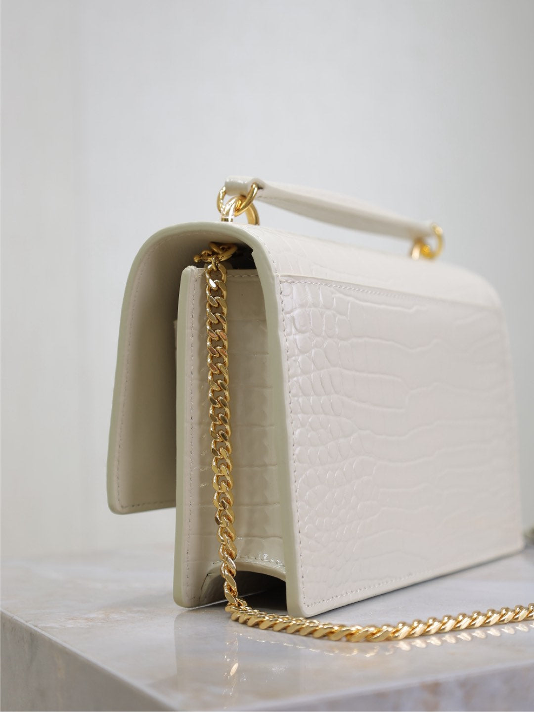 SUNSET SMALL BAG 19 IN WHITE CROCODILE-EMBOSSED CALFSKIN GOLD HARDWARE