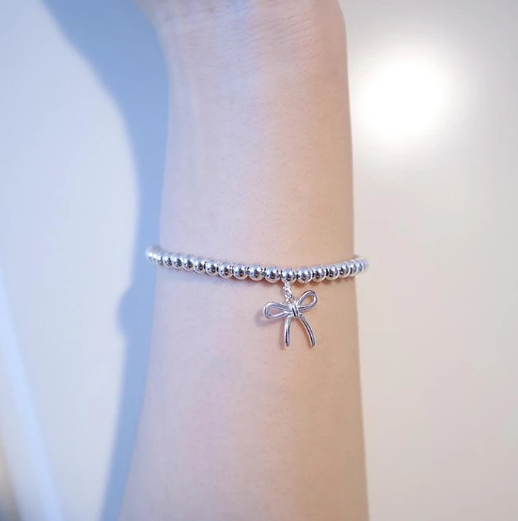 STERLING SILVER BOW BEAD BRACELET