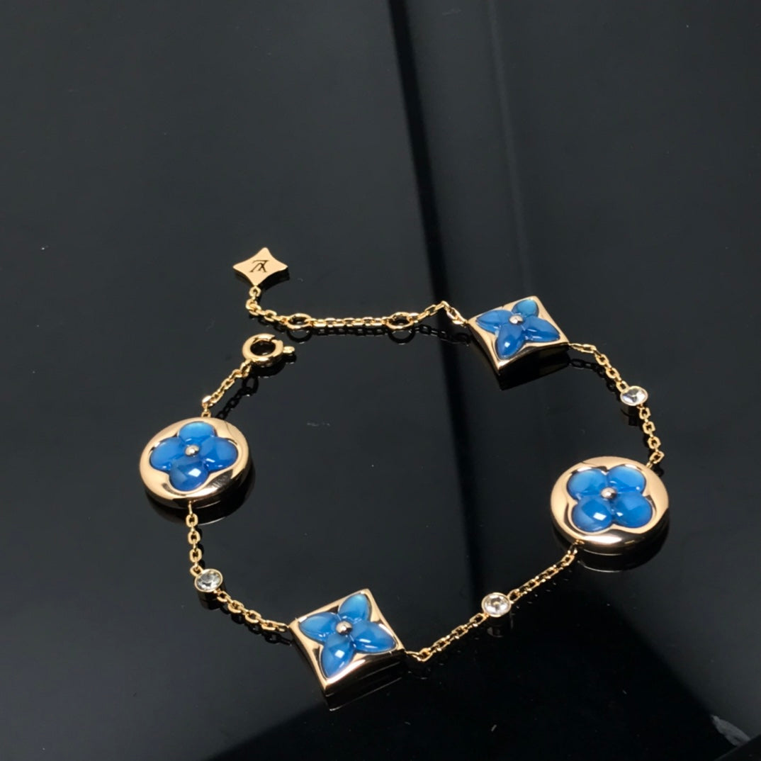 STAR AND SUN 4 MOTIF BLUE BRACELET